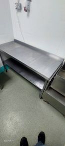 Stainless still tables