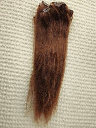 100% human hair clip-in extensions 20 inch