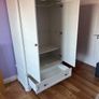 White double door high wardrobe with bottom drawer and shelf Image 4