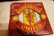 two man united wall clocks,  in original packaging