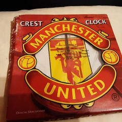two man united wall clocks,  in original packaging