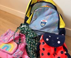 4 backpacks and 1 shoulder bag