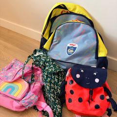 4 backpacks and 1 shoulder bag