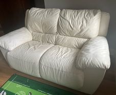 Two seater cream leather couch