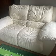 Two seater cream leather couch