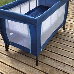 2 tier Travel cot with changing table. excellent condition.