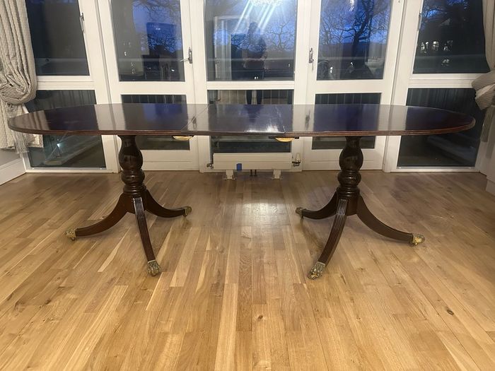 Extendable mahogany dining table and 8 Reprodux chairs