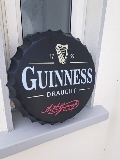 Guinness  bottle top metal sign