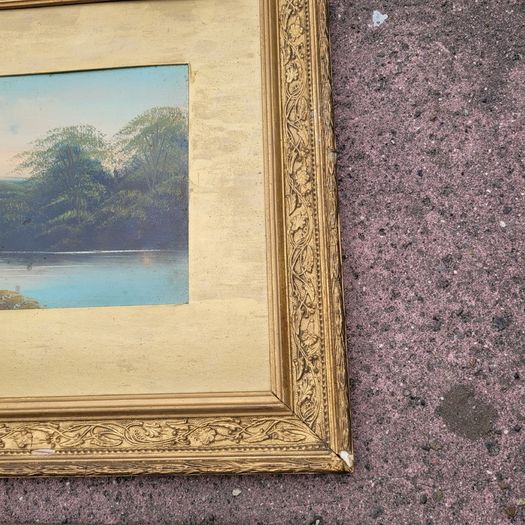 Antique trio of giltwood framed landscapes
