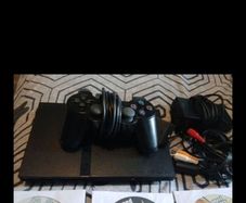 ps2 slim with controller and games