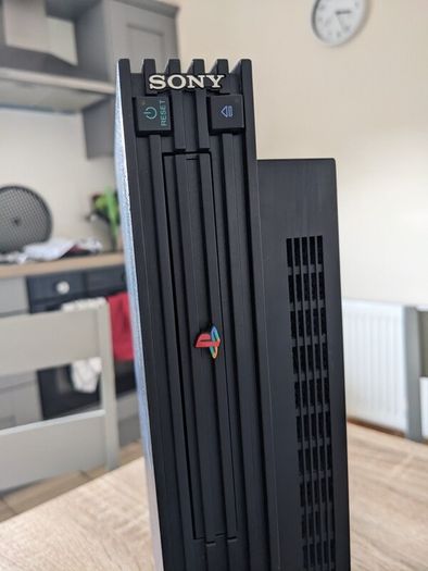 PS2 console with controller and cables