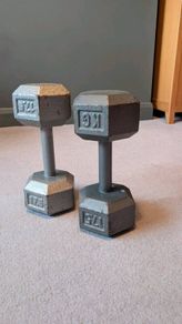 Pair of solid case iron dumbbells