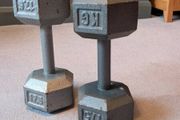 Pair of solid case iron dumbbells