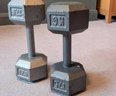 Pair of solid case iron dumbbells