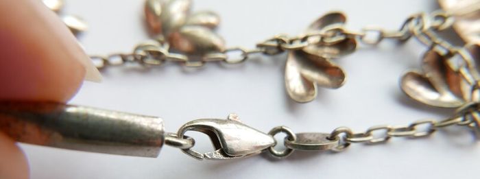 Vintage 925 Sterling Silver charm bracelet with flower charms