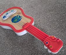 Toy Ukulele Baby Einstein.