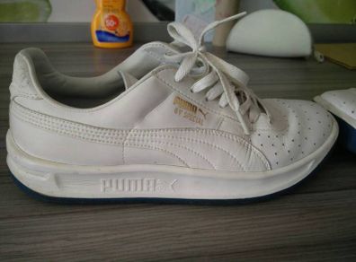 Puma GV trainers.