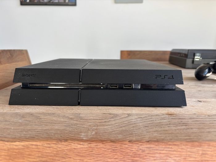 Sony PS4 and 2 controllers