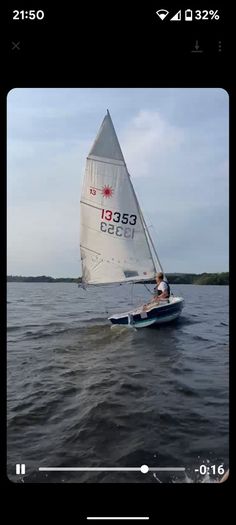 Laser 13 sailboat with road and launching trailer