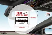 Oil service reminder sticker.