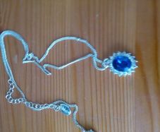 Necklace And Earring set with nice blue stone .
