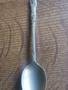 Vintage teaspoon with a saint on the handle