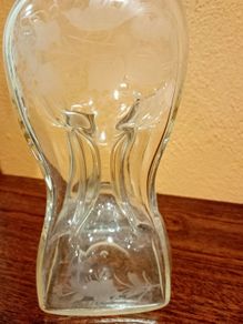 Antique hourglass shaped glass decanter