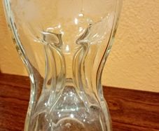 Antique hourglass shaped glass decanter