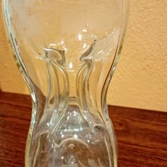 Antique hourglass shaped glass decanter
