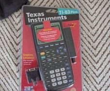 Texas Instruments TI-83 Plus, brand new in packaging