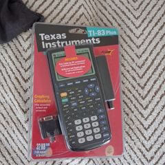 Texas Instruments TI-83 Plus, brand new in packaging