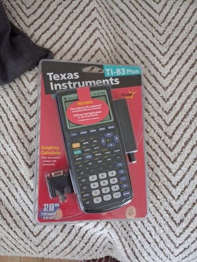 Texas Instruments TI-83 Plus, brand new in packaging