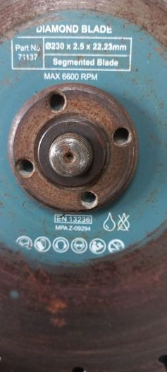 Makita GA9020S  corded angle grinder,  complete with a diamond blade.