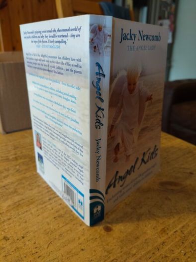 "Angel Kids" by Jacky Newcomb, a UK-based author known as "The Angel Lady".The book focuses on true-life stories regarding children's experiences with guardian angels and paranormal abilities.