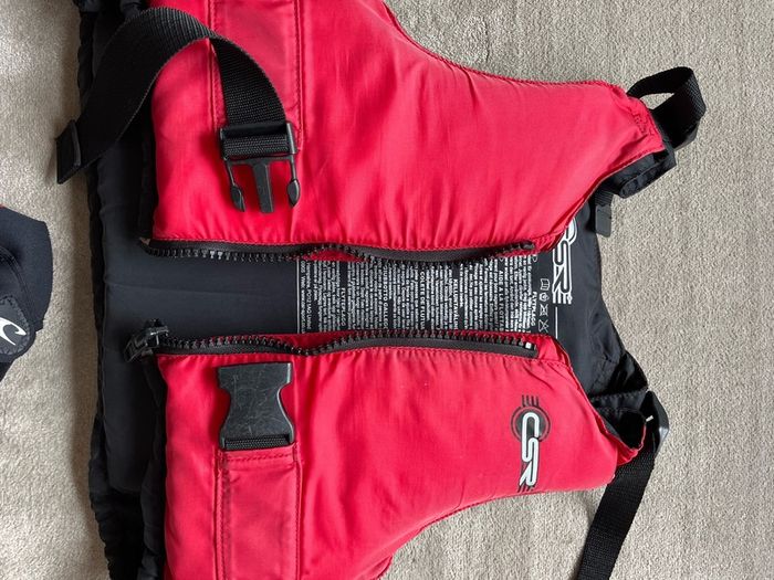 O'Neill child's 2mm shorty wetsuit and buoyancy aid.