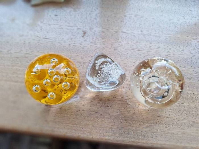Three paper weights
