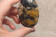 black and yellow tourmaline in quartz palmstone