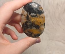 black and yellow tourmaline in quartz palmstone