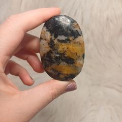 black and yellow tourmaline in quartz palmstone