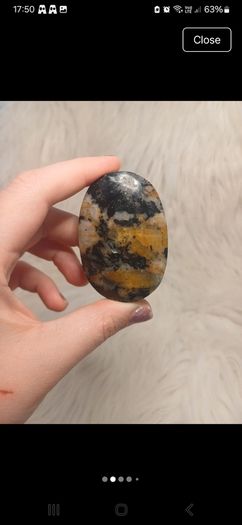 black and yellow tourmaline in quartz palmstone