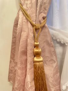 Gold curtain tieback
