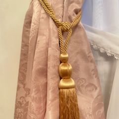 Gold curtain tieback