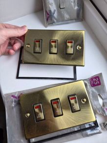 Antique brass electrical sockets and switches
