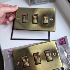 Antique brass electrical sockets and switches
