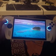 pc gaming handheld with external usb hub docking station