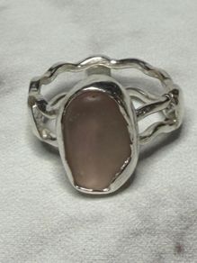 Handmade sterling silver wave ring with pink sea glass. Size L