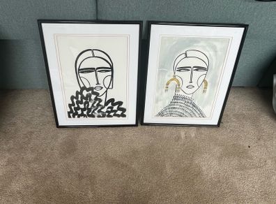 Framed modern art drawings of fashion girls