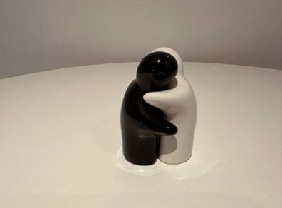 Salt and Pepper People Hugging
