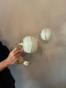 Spherical gold wall lights (set of two)