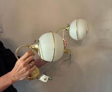 Spherical gold wall lights (set of two)